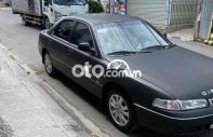 Mazda 626 1996 - Màu đen, chính chủ giá 88 triệu tại Tp.HCM