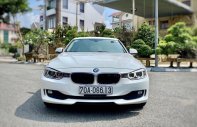 BMW 328i 2015 - Cần bán lại xe BMW 328i đời 2015, màu trắng, nhập khẩu nguyên chiếc còn mới, giá tốt giá 979 triệu tại Tp.HCM
