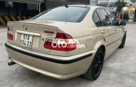 BMW 318i 2002 - Bán xe BMW 318i sản xuất năm 2002, màu vàng giá 150 triệu tại Tp.HCM