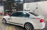 BMW 320i 2011 - Màu trắng chính chủ, giá chỉ 415 triệu giá 415 triệu tại Nghệ An