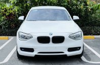 BMW 116i 2014 - Xe màu trắng giá 610 triệu tại Hà Nội