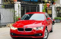 BMW 320i 2016 - Màu đỏ, xe nhập, giá cực tốt giá 895 triệu tại Nghệ An