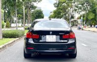 BMW 328i 2012 - Màu đen, nội thất đen giá 699 triệu tại Tp.HCM