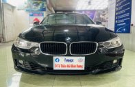 BMW 320i 2014 - Màu đen, nội thất đen, nhập khẩu Đức giá 655 triệu tại Tp.HCM