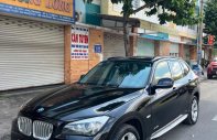 BMW X1 2011 - Màu đen, nhập khẩu nguyên chiếc còn mới giá 410 triệu tại Bình Dương