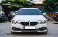 BMW 320i 2016 - Xe màu trắng giá 850 triệu tại Hà Nội