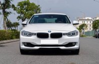 BMW 320i 2013 - Màu trắng, nhập khẩu số tự động giá 660 triệu tại Hà Nội