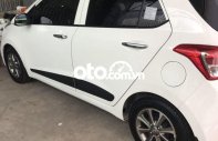 Hyundai Grand i10 Xe hunhdai i 10 1.0 at trăng lăn bánh 48000km 2015 - Xe hunhdai i 10 1.0 at trăng lăn bánh 48000km giá 285 triệu tại An Giang