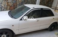 Ford Laser   2003 Ghia, số sàn, màu trắng 2003 - Ford laser 2003 Ghia, số sàn, màu trắng giá 107 triệu tại An Giang