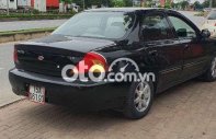 Kia Spectra Bán   màu đen sx204 đc1.6MT xe CC mới đk 2004 - Bán KIA Spectra màu đen sx204 đc1.6MT xe CC mới đk giá 73 triệu tại Hải Phòng