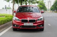BMW 218i 2015 - Biển đẹp Hà Nội, màu đỏ cá tính, nội thất kem, bảo dưỡng lịch sử hãng đầy đủ giá 590 triệu tại Hà Nội