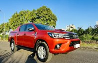 Toyota Hilux 2016 - màu cam, odo 15 vạn, xe zin 100% giá 555 triệu tại Tp.HCM