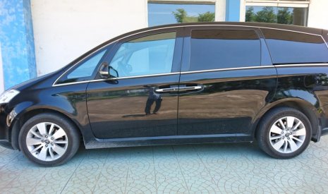 Luxgen M7 AT 2011 - Cần bán lại xe Luxgen M7 AT sản xuất 2011, màu đen, nhập khẩu số tự động, 460tr