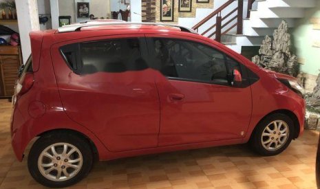 Chevrolet Spark LTZ 2014 - Cần bán xe Chevrolet Spark LTZ sản xuất 2014, màu đỏ