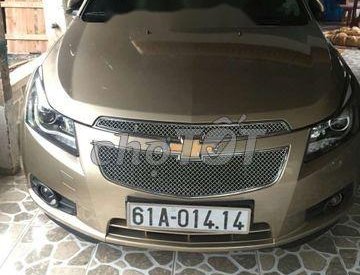 Chevrolet Cruze 2011 - Bán Chevrolet Cruze sản xuất năm 2011, màu vàng cát