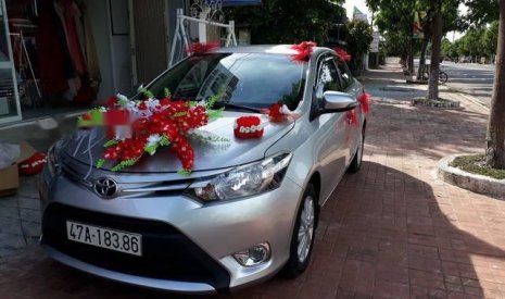 Toyota Vios 2015 - Cần bán gấp Toyota Vios năm sản xuất 2015, màu bạc