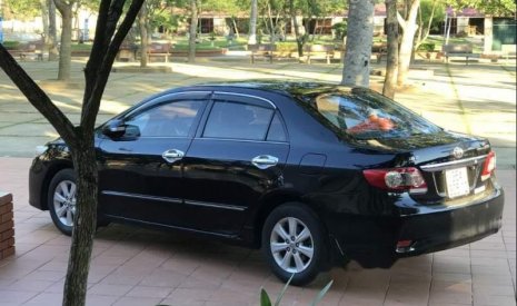 Toyota Corolla altis   1.8AT  2013 - Cần bán gấp Toyota Corolla altis 1.8AT 2013, màu đen như mới, 595 triệu