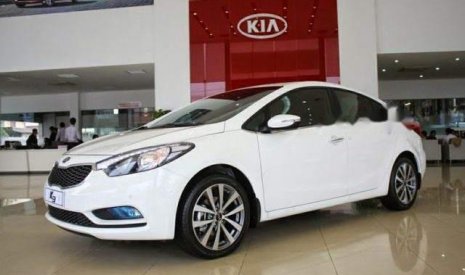 Kia K3 2015 - Bán ô tô Kia K3 2015, màu trắng số sàn 