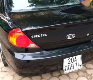 Kia Spectra 2004 - Cần bán lại xe Kia Spectra đời 2004, màu đen, nhập khẩu xe gia đình