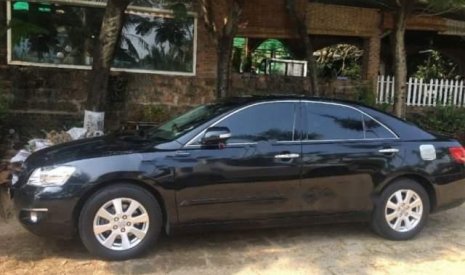 Toyota Camry 2.4G 2007 - Bán ô tô Toyota Camry 2.4G sản xuất năm 2007, màu đen chính chủ giá cạnh tranh