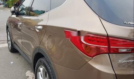 Hyundai Santa Fe   2015 - Bán Hyundai Santa Fe đời 2015, màu vàng