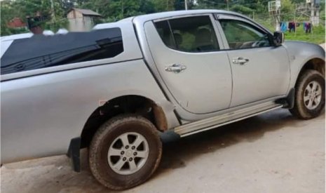 Mitsubishi Triton   2013 - Bán Mitsubishi Triton sản xuất 2013, màu bạc, 380 triệu