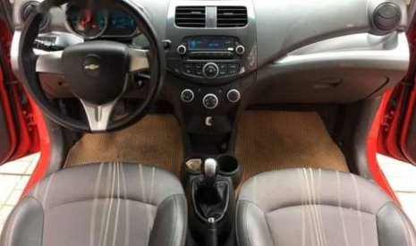 Chevrolet Spark  LT  2016 - Bán xe Chevrolet Spark LT sx 2016 bản đủ, máy xăng, 5 chỗ, Đk T6/2016, màu đỏ, bảng số Sài Gòn