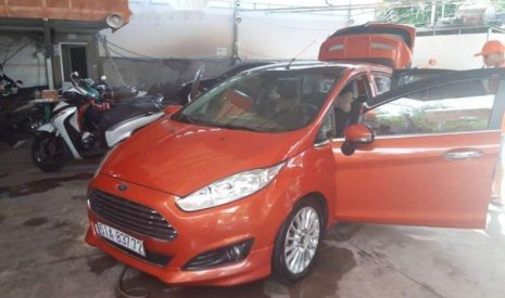 Ford Fiesta 2014 - Cần bán gấp Ford Fiesta đời 2014, màu đỏ, xe nhập chính chủ, giá 420tr