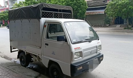 Suzuki Supper Carry Truck 2010 - Bán xe tải Suzuki 5 tạ thùng bạt sản xuất 2010, màu trắng, 145 triệu - Hải Phòng 0936779976