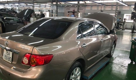 Toyota Corolla altis   2010 - Bán Toyota Corolla altis 2010, màu nâu, xe cam kết không đâm đụng ngập nước