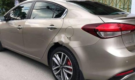 Kia Cerato   2016 - Bán Kia Cerato đời 2016, màu vàng, nhập khẩu  