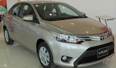 Toyota Vios 1.5E CVT 2020 - Bán ô tô Toyota Vios 1.5E CVT năm sản xuất 2020, màu nâu vàng, giá cạnh tranh