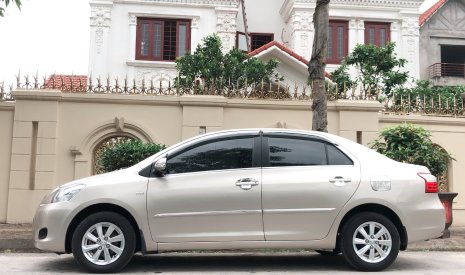 Toyota Vios 1.5E 2014 - Cần bán Toyota Vios 1.5E 2014, màu vàng, số sàn