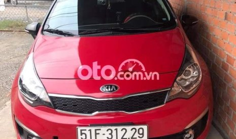 Kia Rio   AT  2015 - Cần bán lại xe Kia Rio AT năm 2015, màu đỏ, nhập khẩu số tự động, giá chỉ 345 triệu