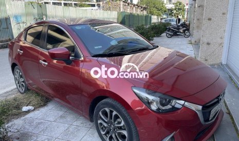 Mazda 2 2016 - Cần bán xe Mazda 2 sản xuất 2016, màu đỏ, 410 triệu