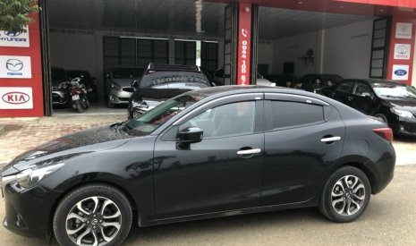 Mazda 2 2015 - Cần bán Mazda 2 1.5AT, màu đen, năm sản xuất 2015